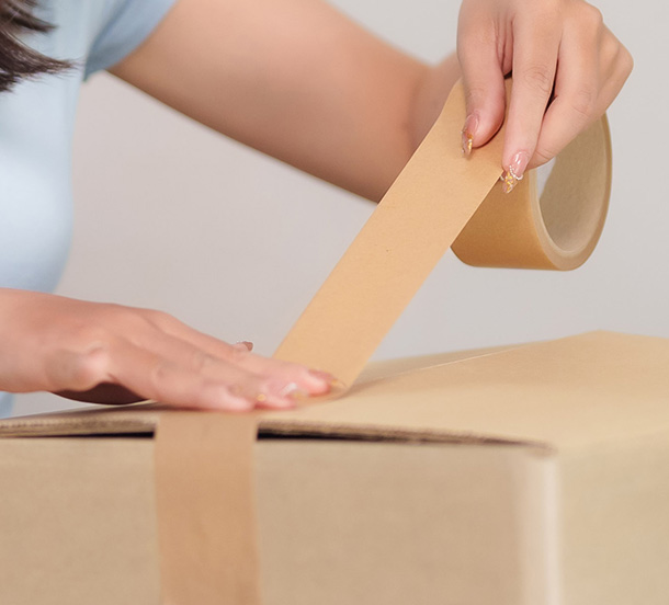 a collection of clothing items on hangers and in bags representing fashion and style choices showcasing personal style and wardrobe organization