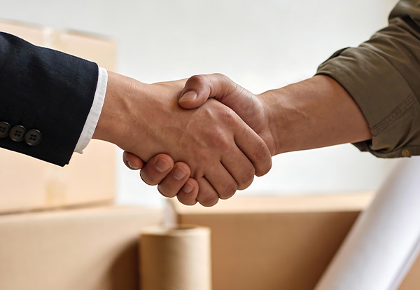 two hands shaking in agreement signifying partnership in business and collaboration three key aspects of success